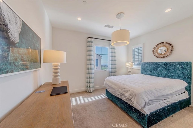 carpeted bedroom with recessed lighting and baseboards