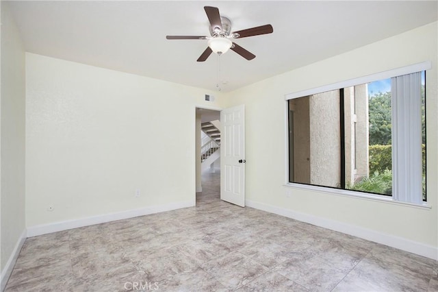611 Colonial Cir, Fullerton, CA 92835 - unfurnished room with a ceiling fan and baseboards