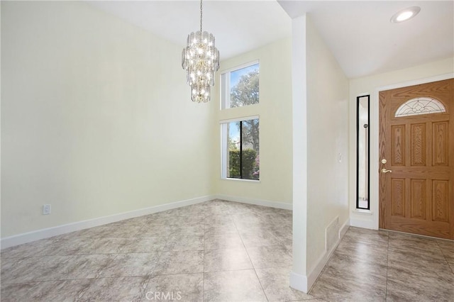 611 Colonial Cir, Fullerton, CA 92835 - entryway with a chandelier, baseboards, and tile patterned flooring