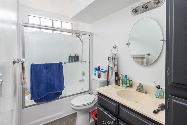 515 W Harvard St, Glendale, CA 91204 - bathroom with shower / bath combination with glass door, wood finished floors, vanity, and toilet