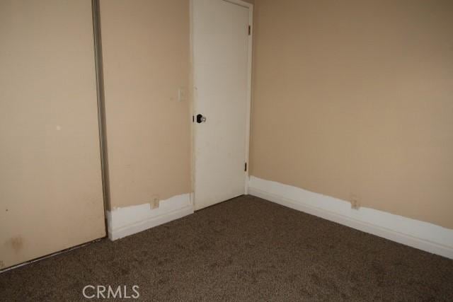 819 Sherwood Way, Willows, CA 95988 - unfurnished room featuring dark colored carpet