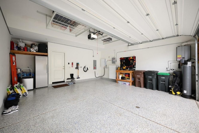 204 Alienta Ln, Rancho Mission Viejo, CA 92694 - garage featuring a garage door opener, freestanding refrigerator, and electric panel