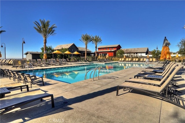 204 Alienta Ln, Rancho Mission Viejo, CA 92694 - community pool featuring a patio area