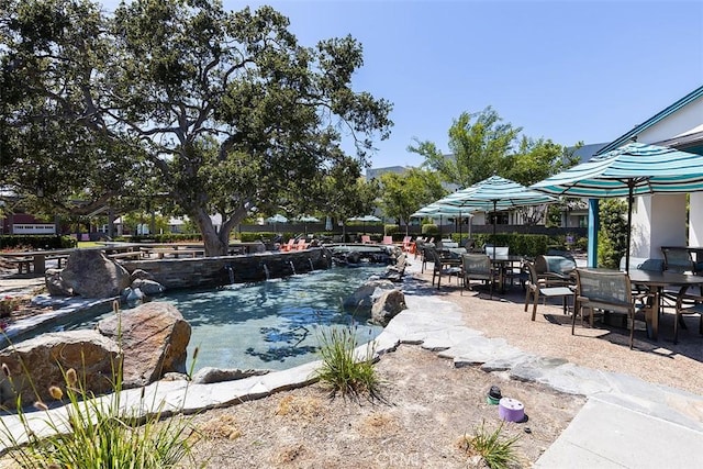 204 Alienta Ln, Rancho Mission Viejo, CA 92694 - swimming pool with a patio and outdoor dining area