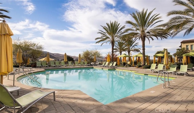 204 Alienta Ln, Rancho Mission Viejo, CA 92694 - community pool featuring a patio area and a mountain view