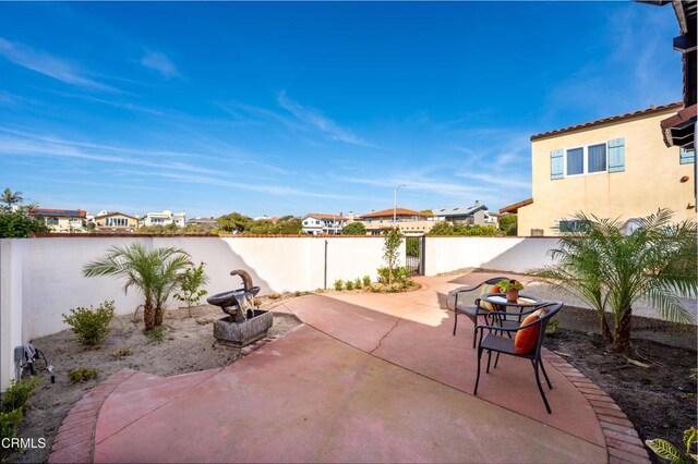 5304 Whitecap St, Oxnard, CA 93035 - fenced backyard with a patio area and a residential view