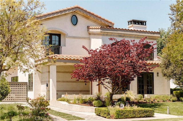 1873 S Los Robles Ave, San Marino, CA 91108 - mediterranean / spanish-style house with a tile roof and stucco siding