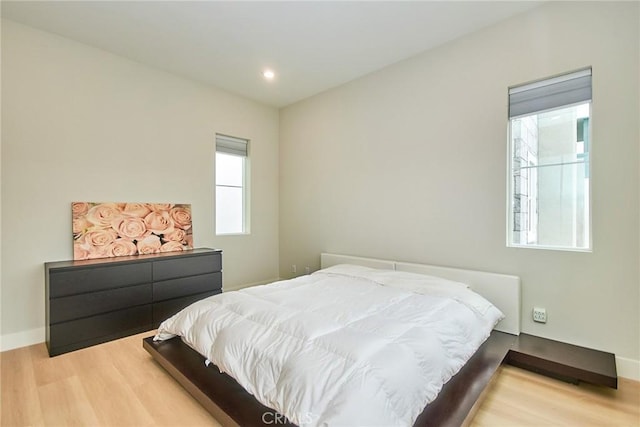 259 Chorus, Irvine, CA 92618 - bedroom featuring wood finished floors and baseboards
