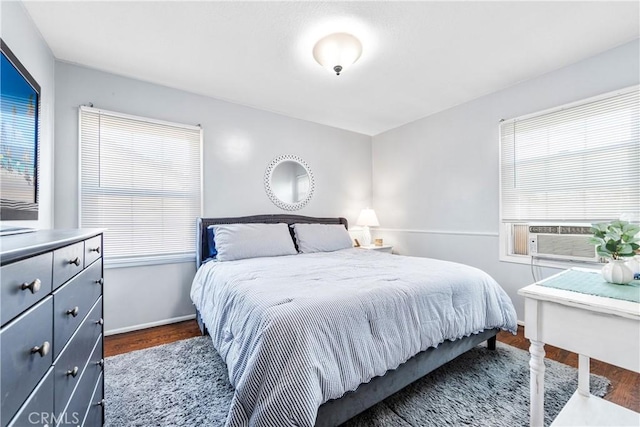 4702 Castana Ave, Lakewood, CA 90712 - bedroom with cooling unit, wood finished floors, and baseboards