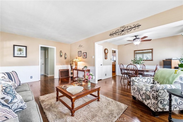 4702 Castana Ave, Lakewood, CA 90712 - living room with wainscoting, ceiling fan, and wood finished floors
