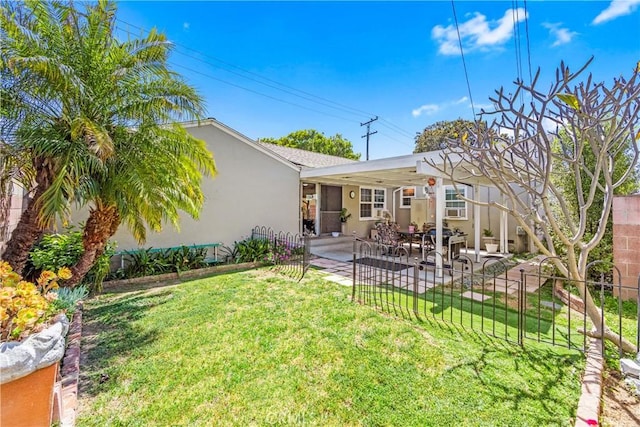 4702 Castana Ave, Lakewood, CA 90712 - rear view of house with a patio and stucco siding