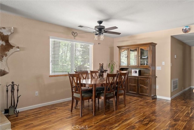 6176 Some Way, Magalia, CA 95954 - dining space with ceiling fan, dark wood-style floors, and baseboards