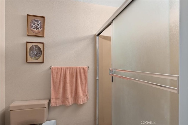 6176 Some Way, Magalia, CA 95954 - bathroom featuring a stall shower and toilet