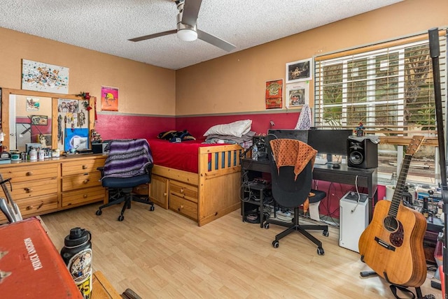 252 Worthington St, Spring Valley, CA 91977 - bedroom with a desk, a textured ceiling, wood finished floors, and ceiling fan