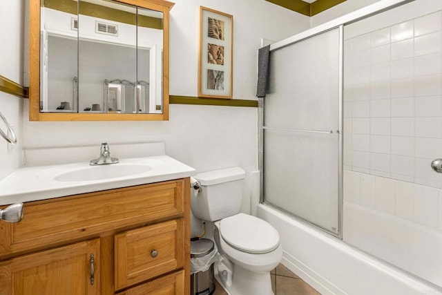 252 Worthington St, Spring Valley, CA 91977 - full bathroom with toilet, vanity, shower / bath combination with glass door, and tile patterned floors