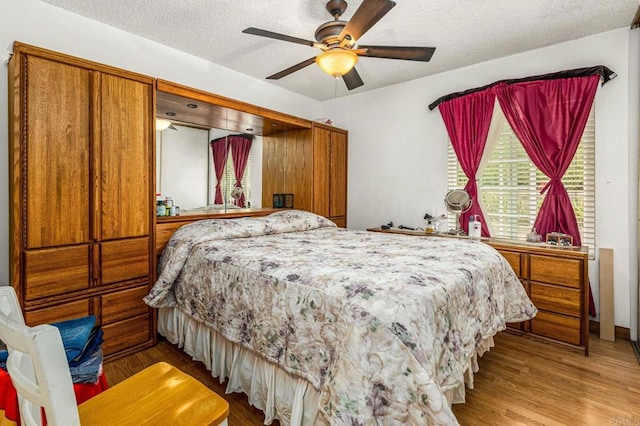 252 Worthington St, Spring Valley, CA 91977 - bedroom with a textured ceiling, wood finished floors, and ceiling fan