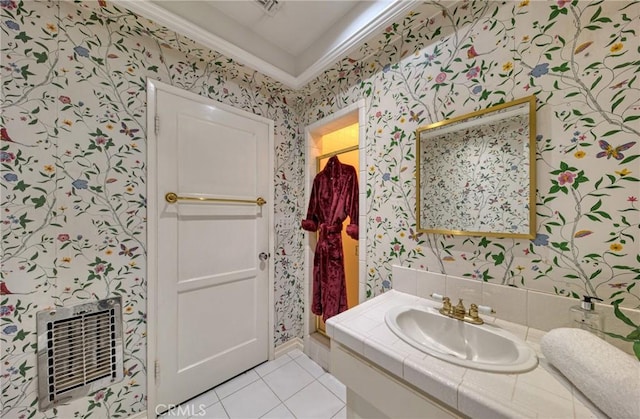full bathroom featuring wallpapered walls, crown molding, tile patterned floors, a shower, and vanity