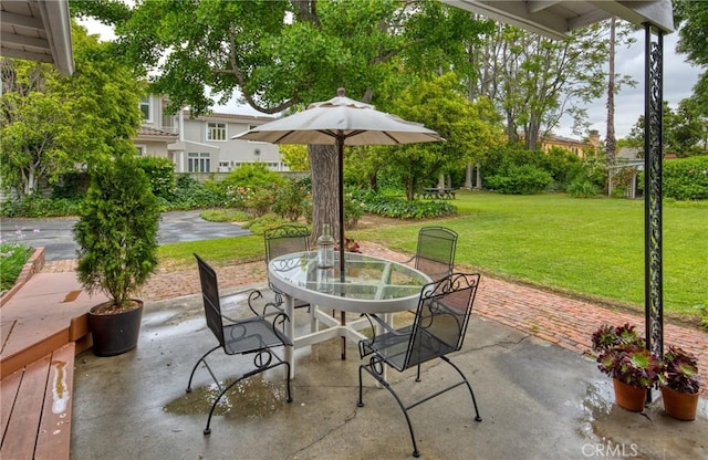 view of patio featuring outdoor dining space