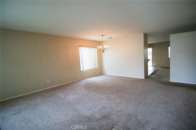 1680 Elmbridge Ln, Hemet, CA 92545 - spare room with a chandelier, healthy amount of natural light, carpet, and baseboards