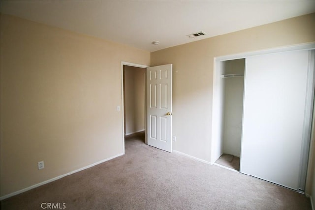 1680 Elmbridge Ln, Hemet, CA 92545 - unfurnished bedroom featuring carpet floors, baseboards, and a closet