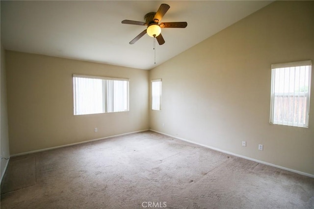 1680 Elmbridge Ln, Hemet, CA 92545 - spare room with vaulted ceiling, a ceiling fan, carpet, and baseboards