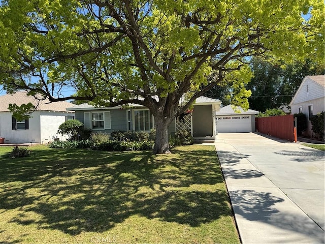 view of front of property with a garage and concrete driveway