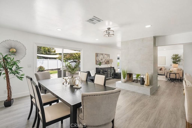 18211 Fairhaven Ave, North Tustin, CA 92705 - dining area featuring light wood finished floors, recessed lighting, and baseboards