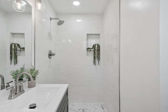 18211 Fairhaven Ave, North Tustin, CA 92705 - bathroom featuring a tile shower and vanity