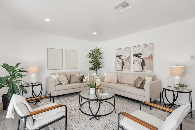 18211 Fairhaven Ave, North Tustin, CA 92705 - living room featuring light wood finished floors, recessed lighting, and baseboards