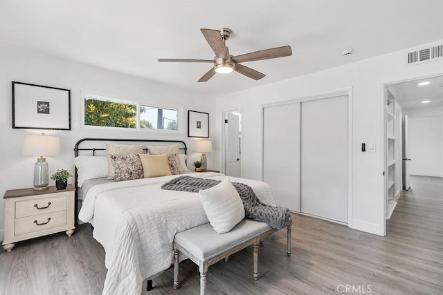 18211 Fairhaven Ave, North Tustin, CA 92705 - bedroom featuring wood finished floors, a closet, and ceiling fan