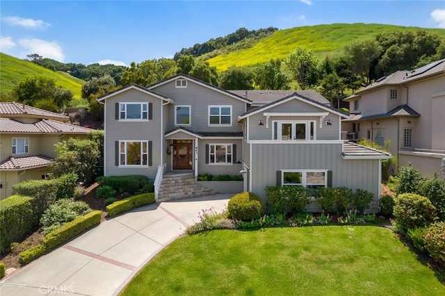 863 Greystone Pl, San Luis Obispo, CA 93401 - view of front of home with board and batten siding and a front lawn
