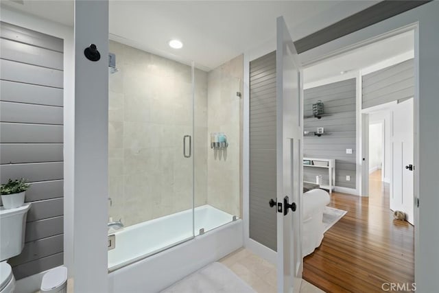 863 Greystone Pl, San Luis Obispo, CA 93401 - bathroom with toilet, combined bath / shower with glass door, recessed lighting, and wooden walls