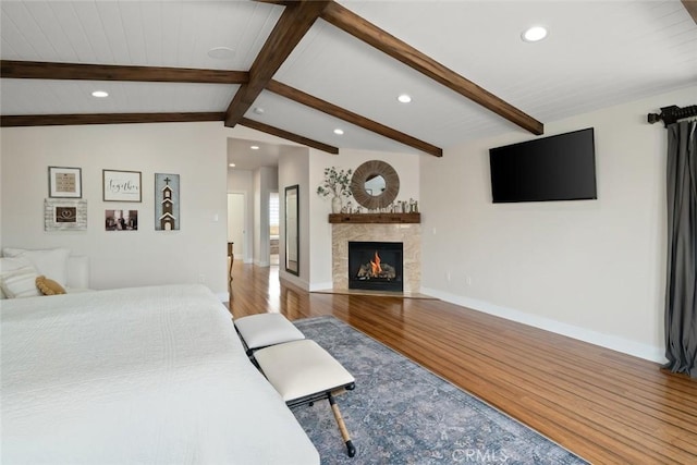 863 Greystone Pl, San Luis Obispo, CA 93401 - bedroom with wood finished floors, recessed lighting, a warm lit fireplace, and baseboards