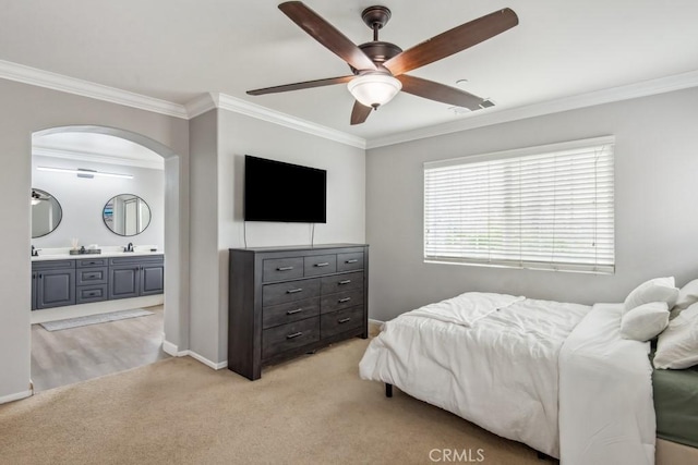 9229 Maywood Way, Riverside, CA 92503 - bedroom featuring ornamental molding, light carpet, arched walkways, and baseboards