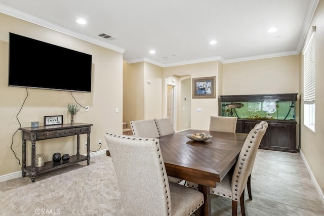 9229 Maywood Way, Riverside, CA 92503 - dining room with baseboards, arched walkways, recessed lighting, and crown molding