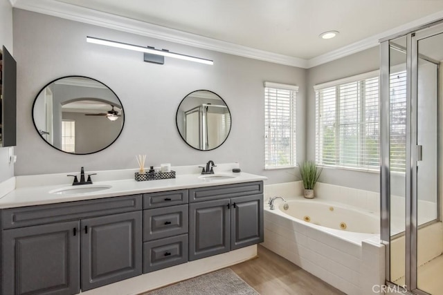9229 Maywood Way, Riverside, CA 92503 - full bath with a tub with jets, a shower stall, wood finished floors, ornamental molding, and double vanity
