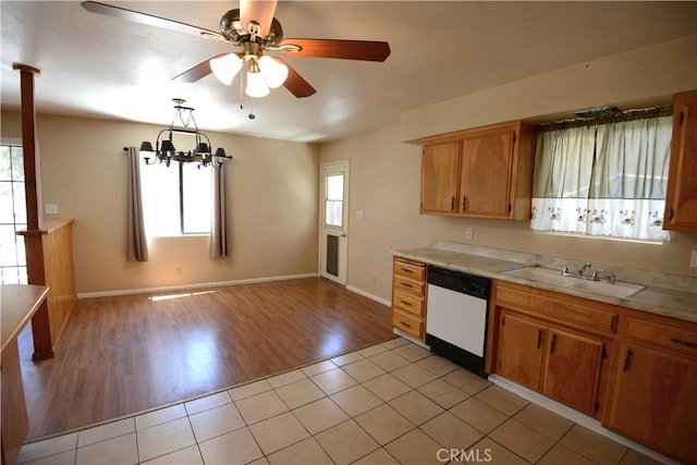 3809 Arroyo Trl, Frazier Park, CA 93225 - kitchen with a sink, white dishwasher, plenty of natural light, and light countertops
