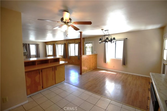 3809 Arroyo Trl, Frazier Park, CA 93225 - kitchen featuring plenty of natural light, a ceiling fan, light tile patterned floors, and light countertops