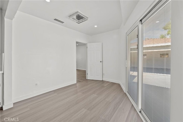10117 Sharp Ave, Arleta, CA 91331 - spare room with light wood-style flooring, baseboards, and recessed lighting