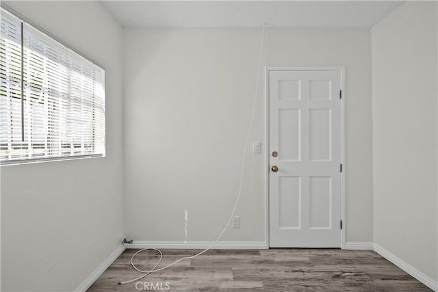 10117 Sharp Ave, Arleta, CA 91331 - empty room featuring wood finished floors and baseboards