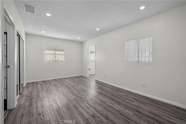 10117 Sharp Ave, Arleta, CA 91331 - unfurnished bedroom with wood finished floors, recessed lighting, and baseboards