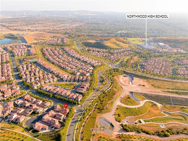 aerial view of property's location featuring nearby suburban area