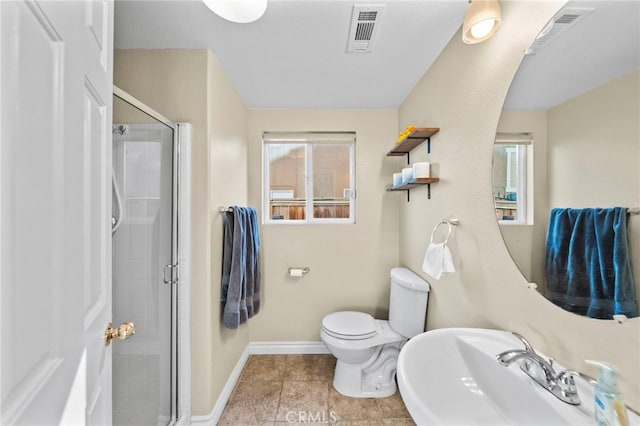 27876 Twilight Ct, Murrieta, CA 92563 - bathroom with a sink, a shower stall, toilet, and baseboards