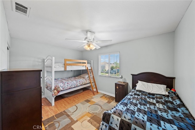 27876 Twilight Ct, Murrieta, CA 92563 - bedroom featuring wood finished floors, ceiling fan, and baseboards