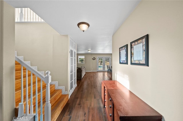 27876 Twilight Ct, Murrieta, CA 92563 - corridor featuring french doors, dark wood-style flooring, and stairway