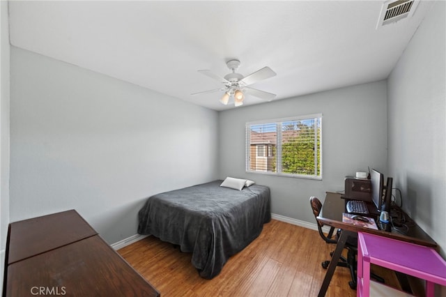 27876 Twilight Ct, Murrieta, CA 92563 - bedroom with light wood-style flooring, a desk, baseboards, and ceiling fan