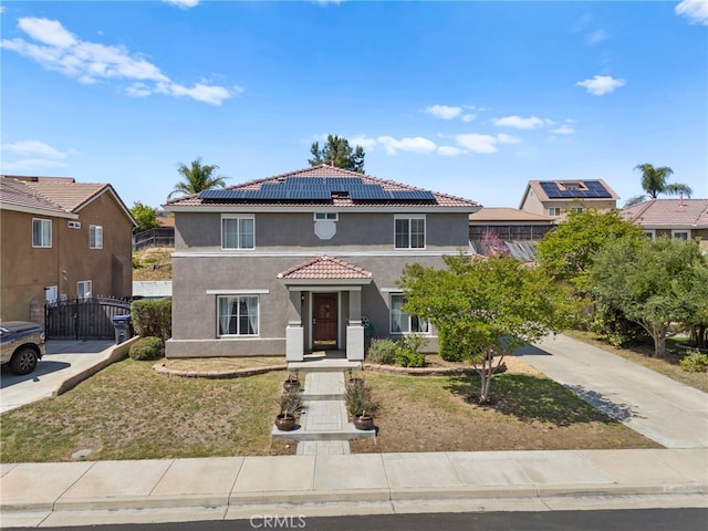 27876 Twilight Ct, Murrieta, CA 92563 - view of front facade with stucco siding, solar panels, and a tile roof