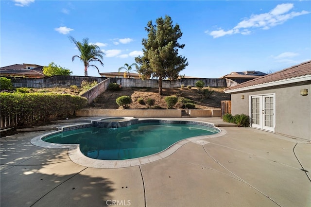 27876 Twilight Ct, Murrieta, CA 92563 - view of swimming pool featuring french doors, a patio, a fenced backyard, and a pool with connected hot tub