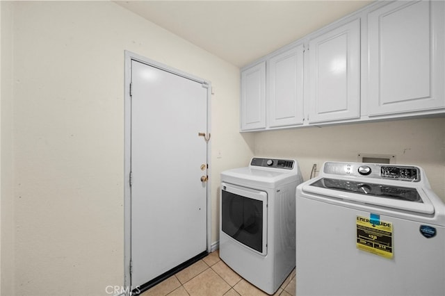 27876 Twilight Ct, Murrieta, CA 92563 - washroom with washing machine and clothes dryer, cabinet space, and light tile patterned floors