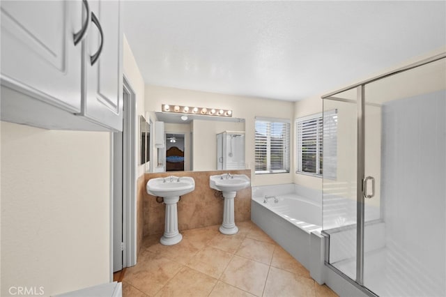 27876 Twilight Ct, Murrieta, CA 92563 - bathroom featuring a shower stall, tile patterned flooring, and a garden tub